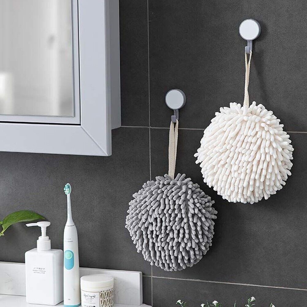 Quick Dry Chenille Hand Towel hanging on a hook in the bathroom