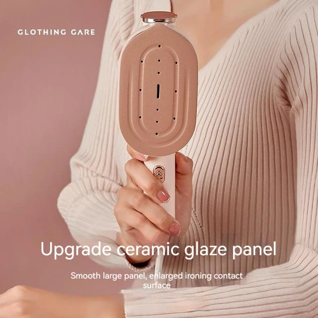 lady holding Portable handheld steam and Press Iron