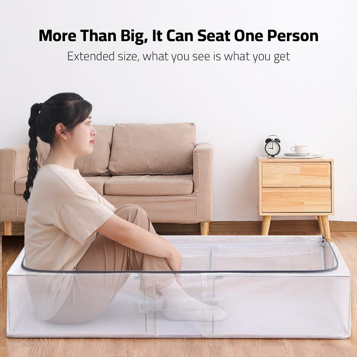 A Women is Sitting in Underbed Storage Box.