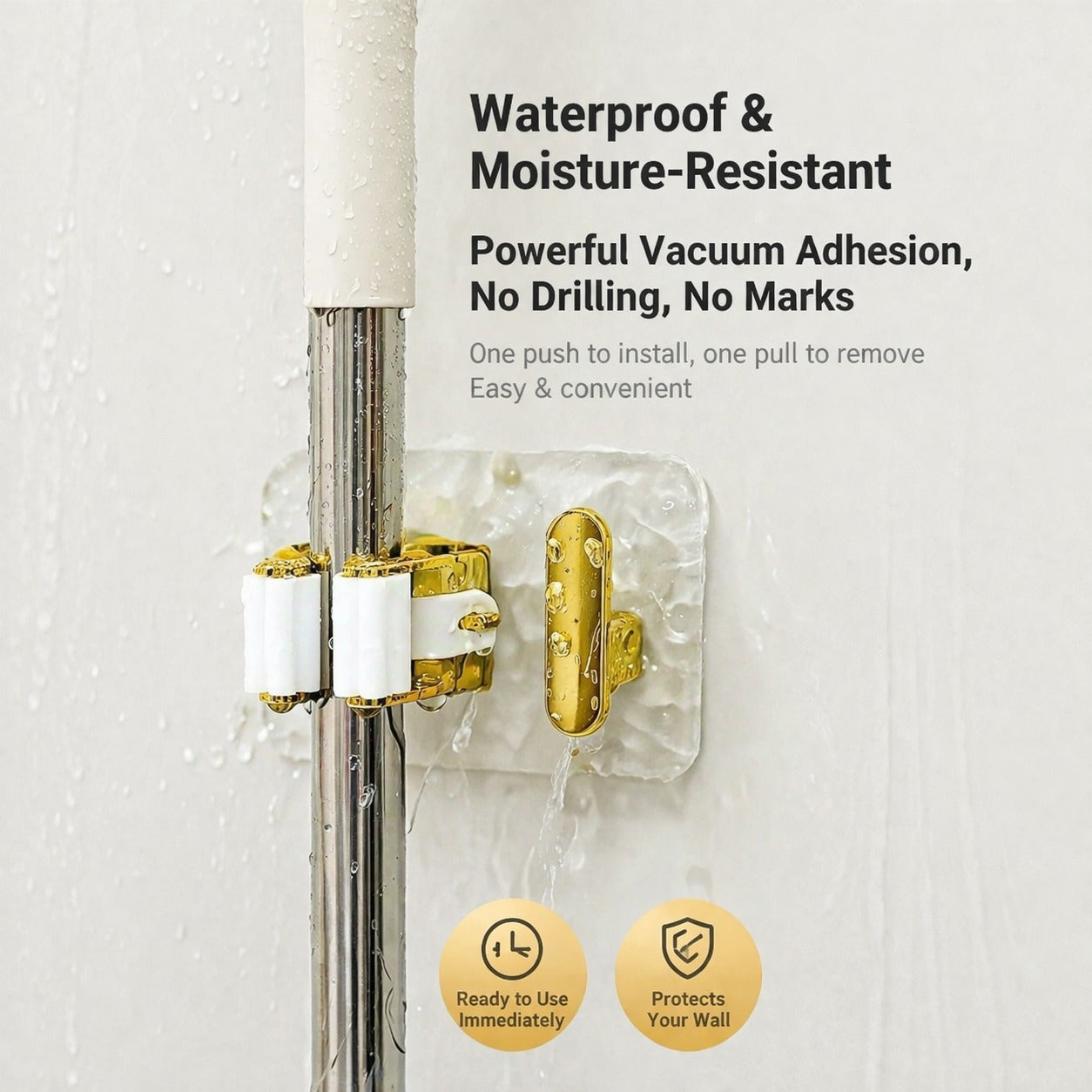 A wall-mounted mop and broom holder with a roller clamp design, featuring strong adhesive backing and an extra hook for hanging accessories, ensuring a secure, non-slip grip without damaging surfaces.