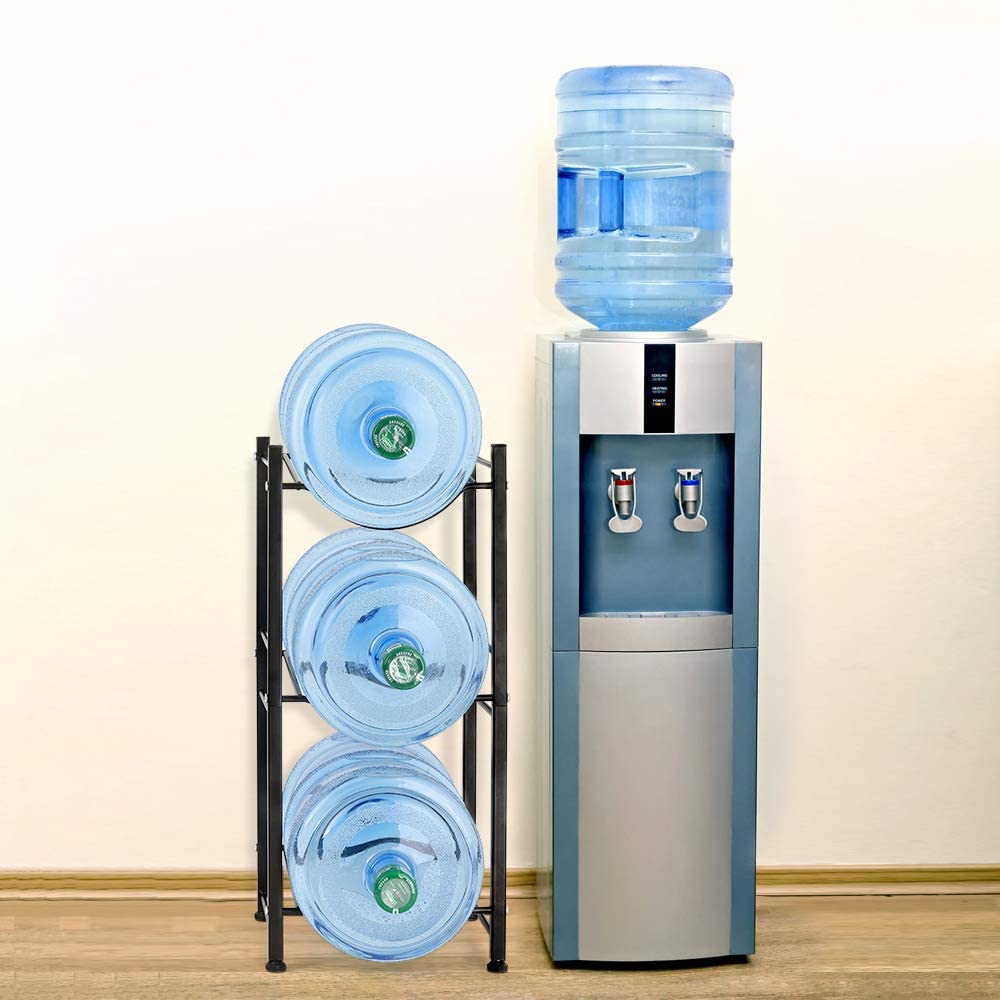 A water cooler with a rack of water bottles
