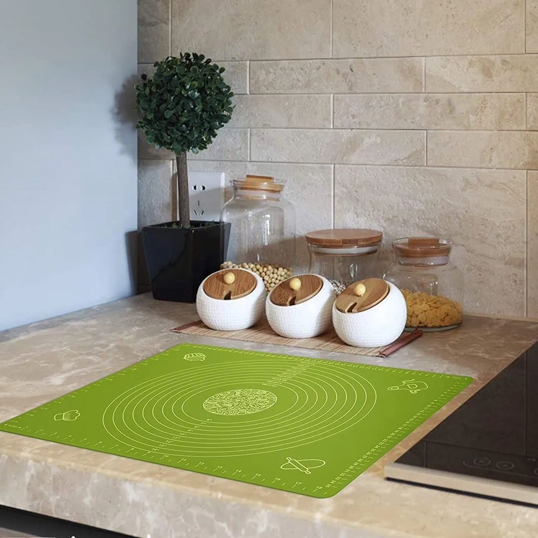Non-stick Silicone Dough Mat next to some items