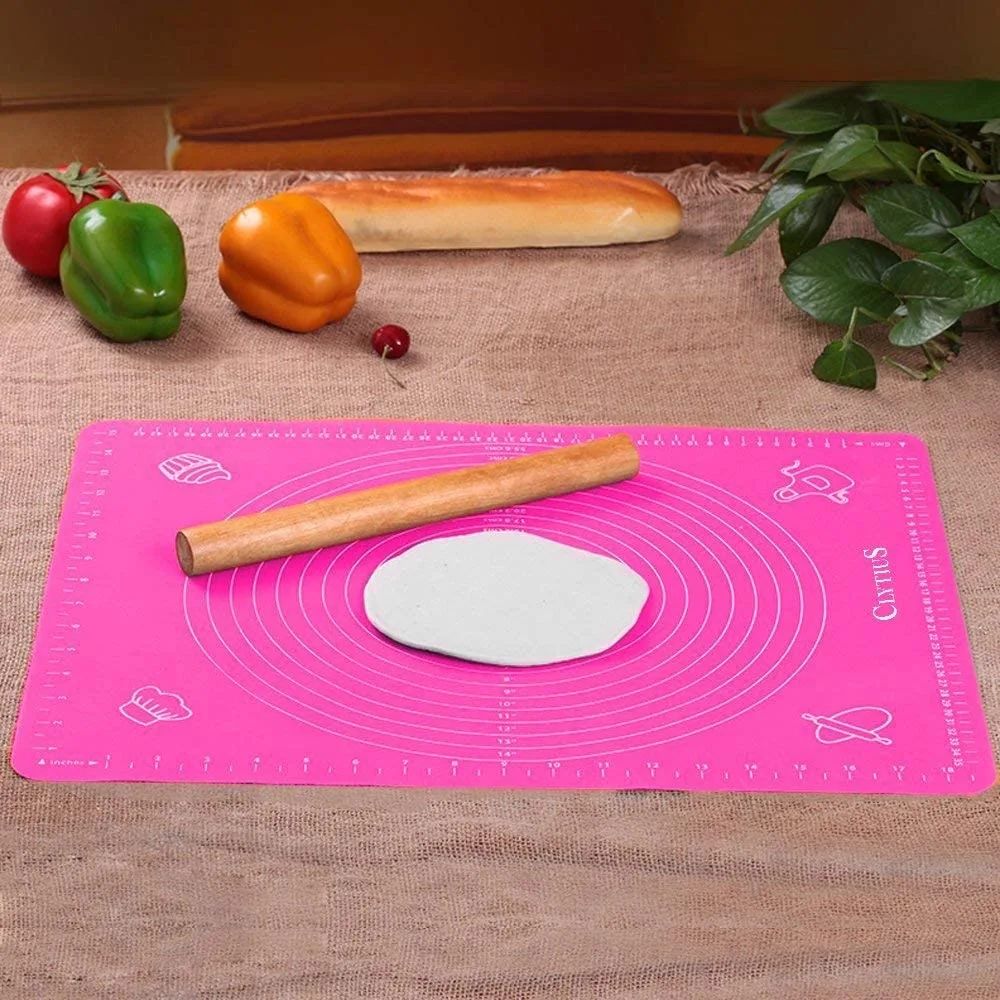 Non-stick Silicone Dough Mat next to some items