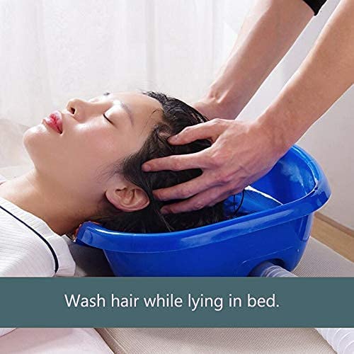 Someone washing his hair with the help of a Portable Hair Wash Basin Tub