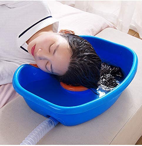 Someone washing his hair with the help of a Portable Hair Wash Basin Tub