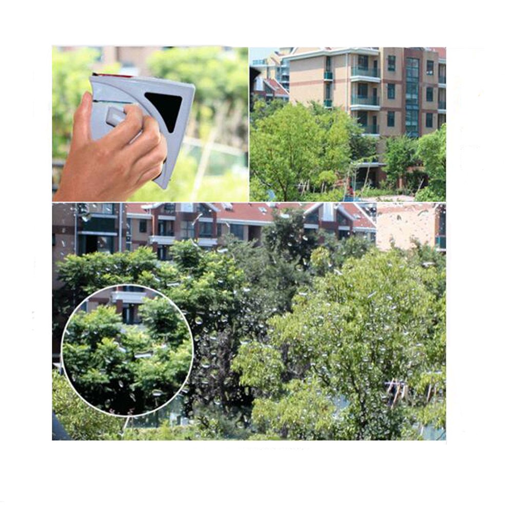 A person cleaning a window with using magnetic window cleaner