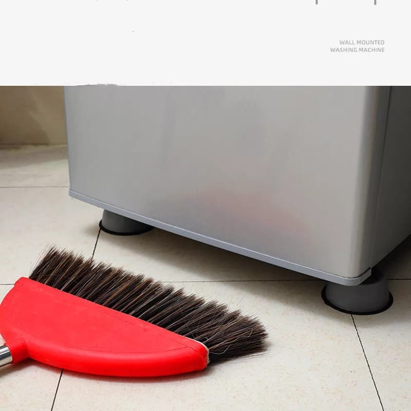 Image displaying bottom portion of a washing machine where Washing Machine Foot Pads has been installed and a broom kept close to it