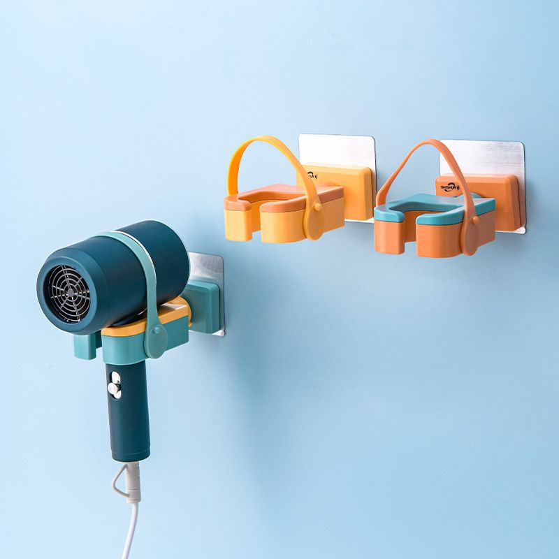 Wall Mount Hair Dryer Organizer placed on the wall