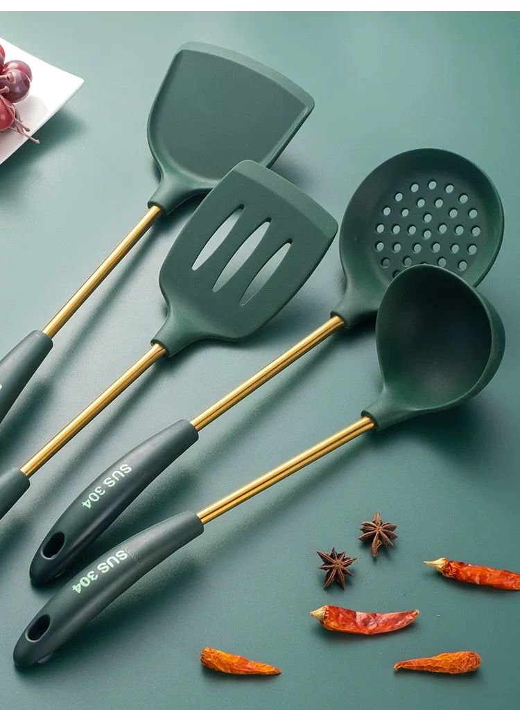 Stainless Steel Silicone Non-Stick Kitchenware placed next to some items