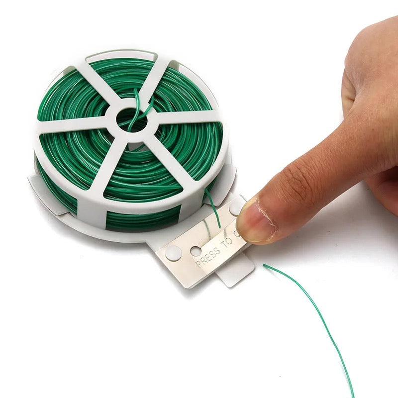 Someone is holding 30 Meters Gardening Plant Green Twist Tie Wire