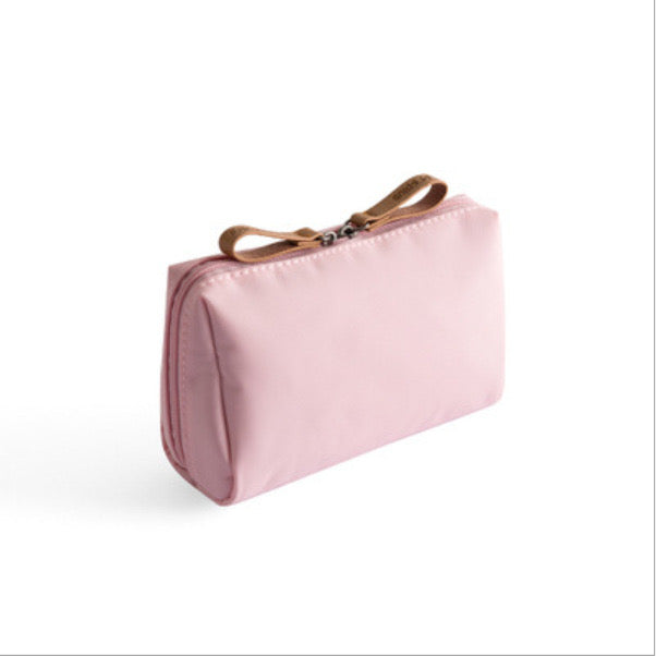 Portable Waterproof Solid Color Cosmetic Bag Toiletry Storage Pouch in pale pink color