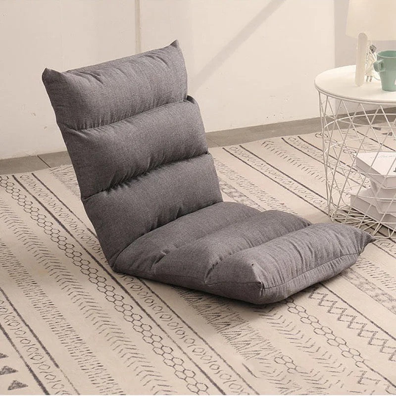 Grey-Black color Lazy Lounge Sofa Bed placed next to a tea table