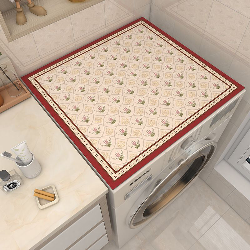 A washing machine covered with Dust Proof Top Cover Mat