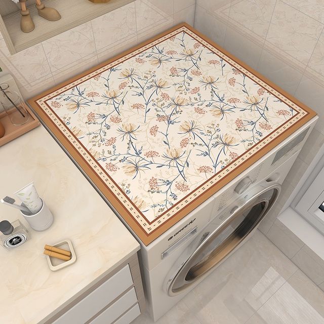 A washing machine covered with Dust Proof Top Cover Mat