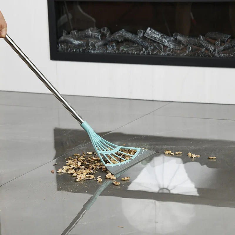Someone cleaning waste with Multifunction Magic Broom with Adjustable Length