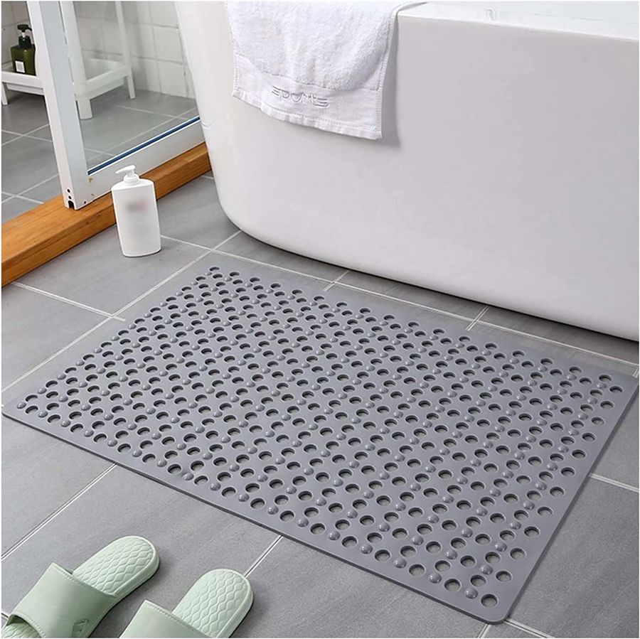 Non-slip extra-long bathroom shower mat placed in the bathroom