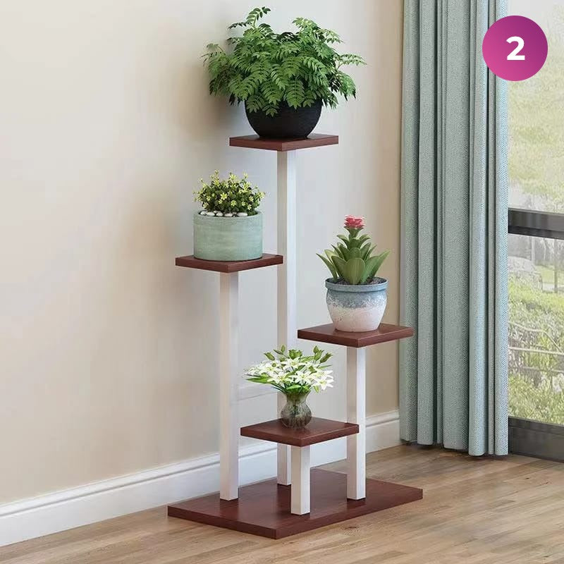 4-Layer Indoor Plant Stand with some plants placed next to a window in a room
