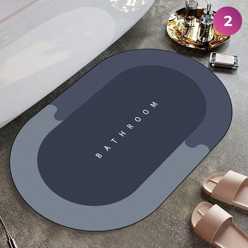 Bathroom Floor Mat placed next to a bath essential set and slippers