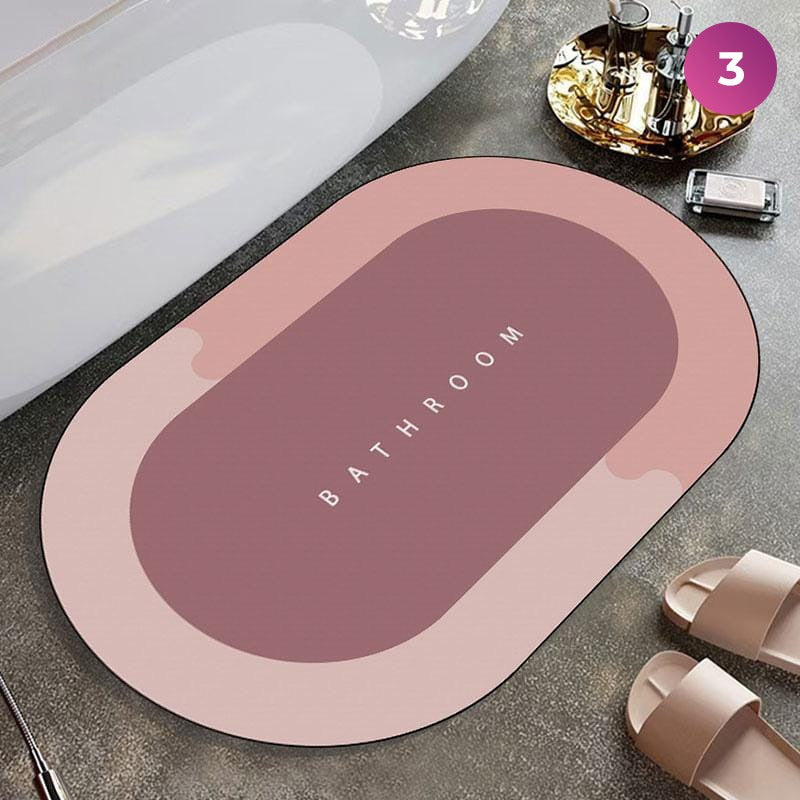 Bathroom Floor Mat placed next to a bath essential set and slippers