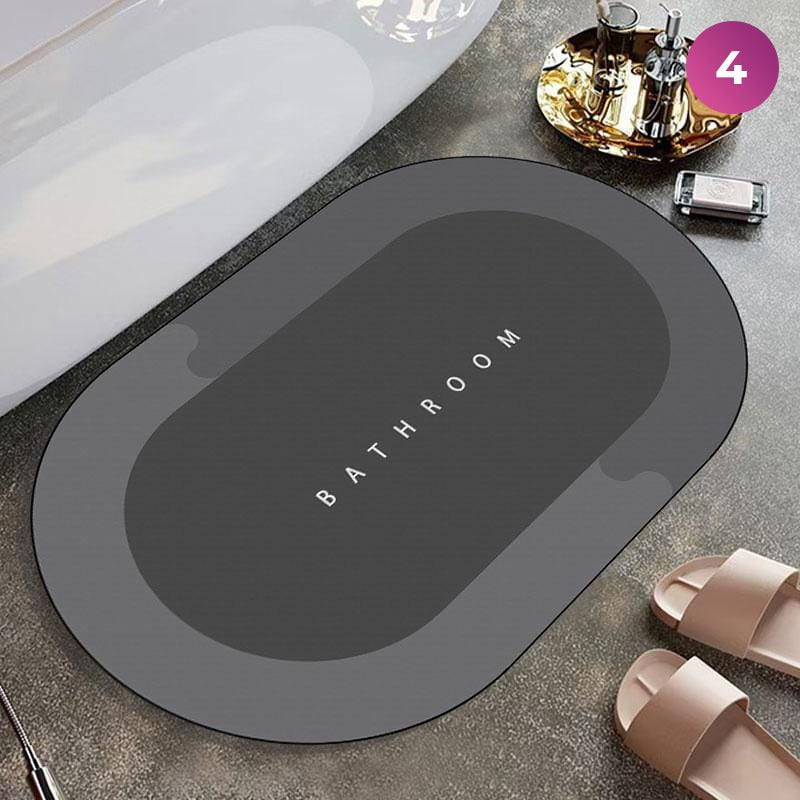 Bathroom Floor Mat placed next to a bath essential set and slippers