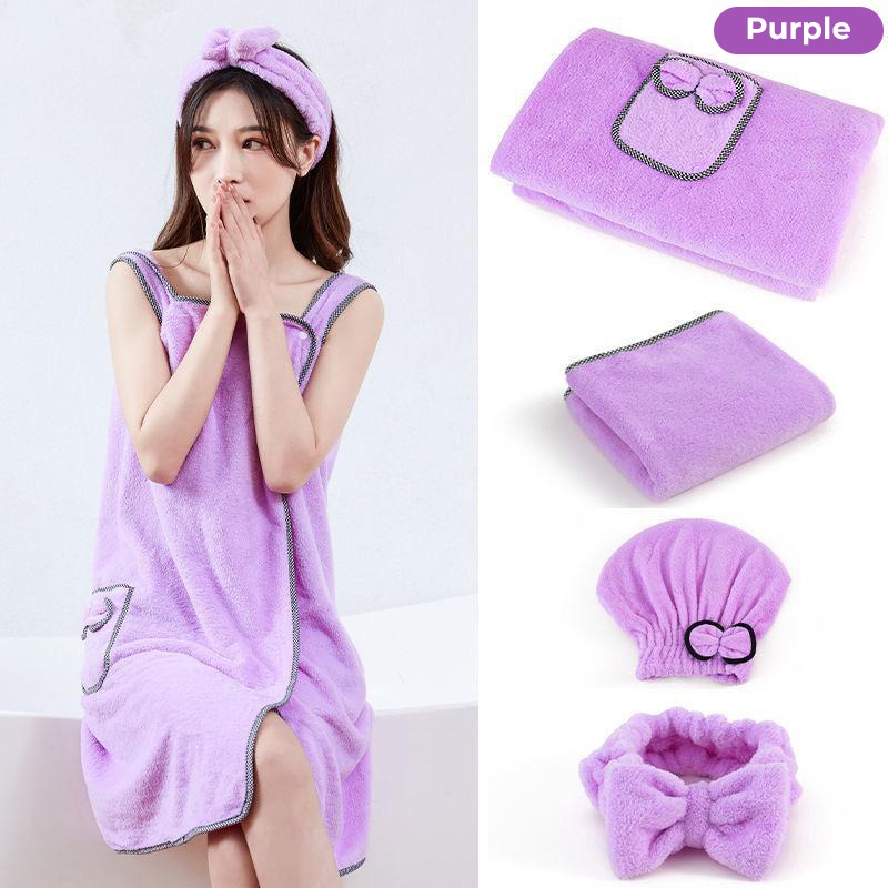 A lady wearing a soft thick microfiber bath towel in purple color