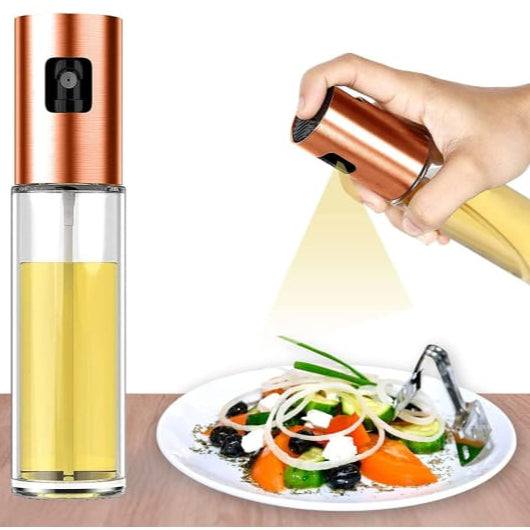 A Person is Spraying Oil On Salad Using 100ml Oil Sprayer Bottle.