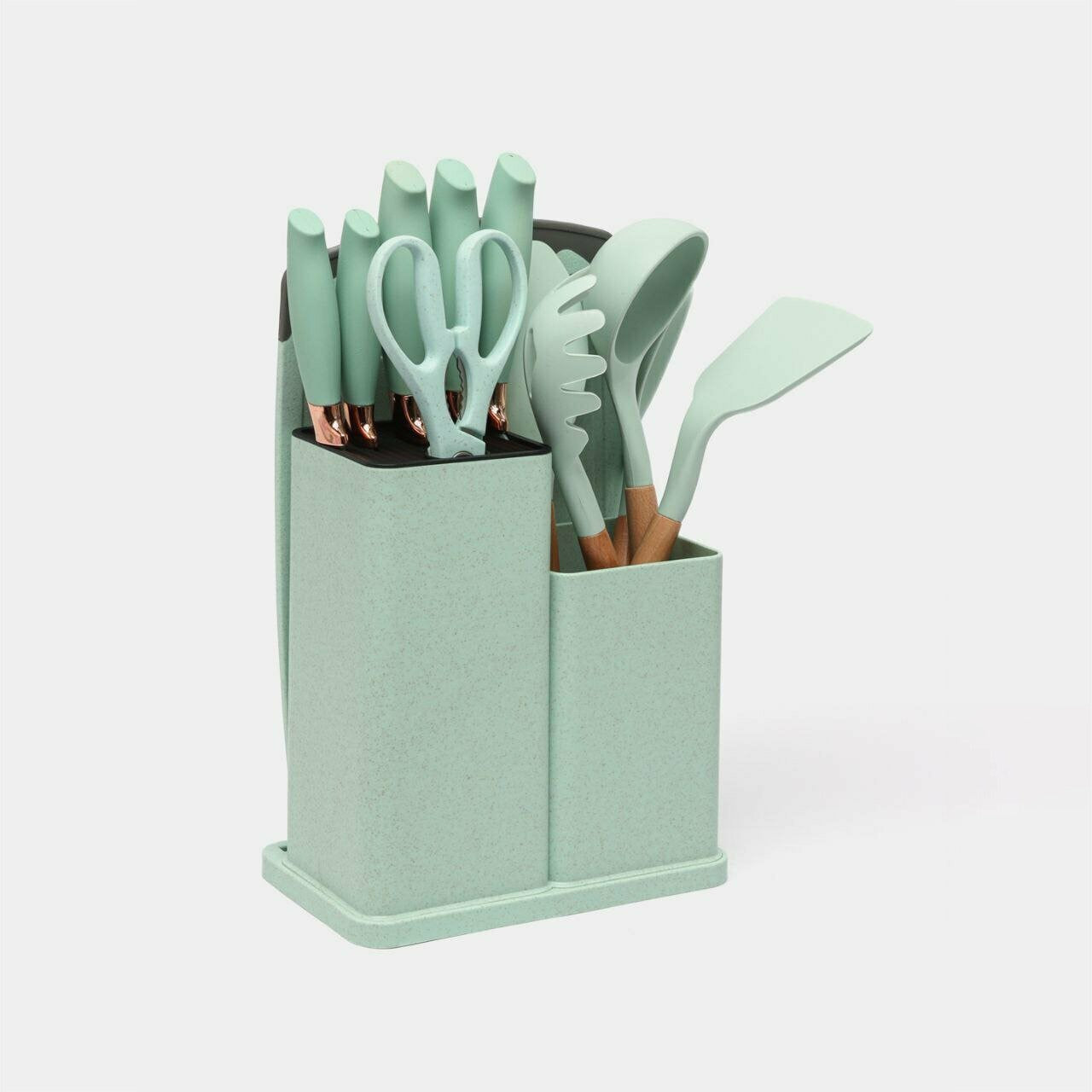 18-piece silicone kitchenware set in a holder including spatulas, ladle, tongs, whisk, pasta server, brushes, and scissors, neatly organized on a kitchen countertop.