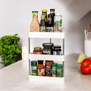 3-Tier Corner Storage Rack with various condiments on a kitchen counter.