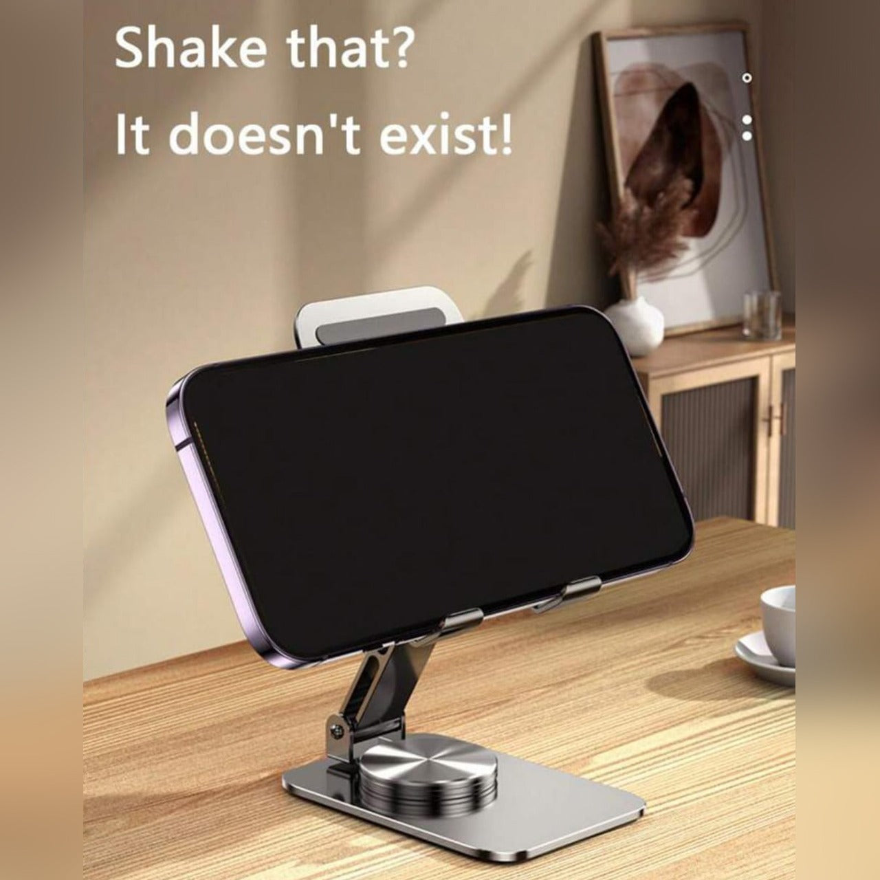 A Mobile Phone is Kept on a 360 Degree Rotating Mobile Phone/ Tablet Holder Stand.