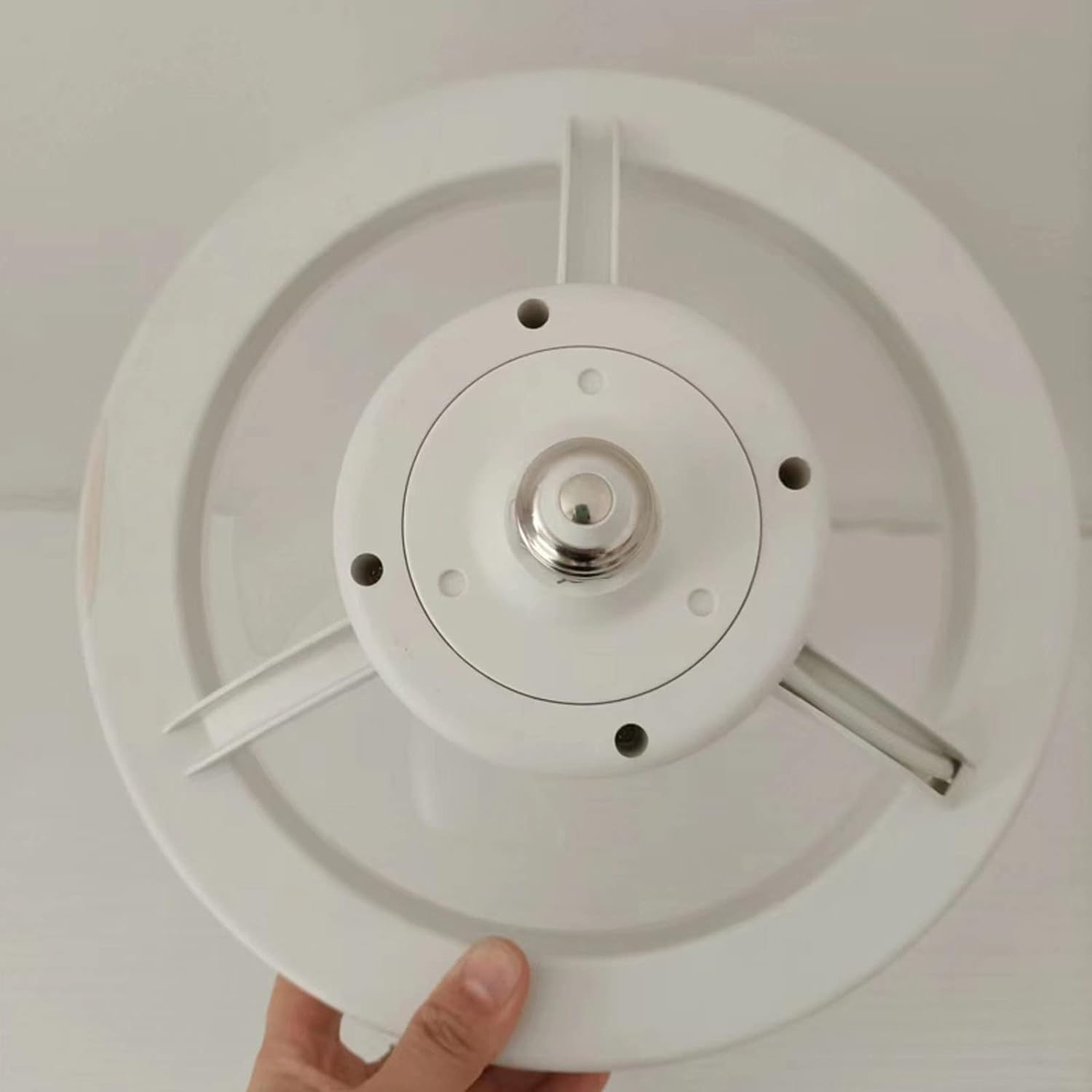 Someone is holding the 360° Rotation LED Fan Light