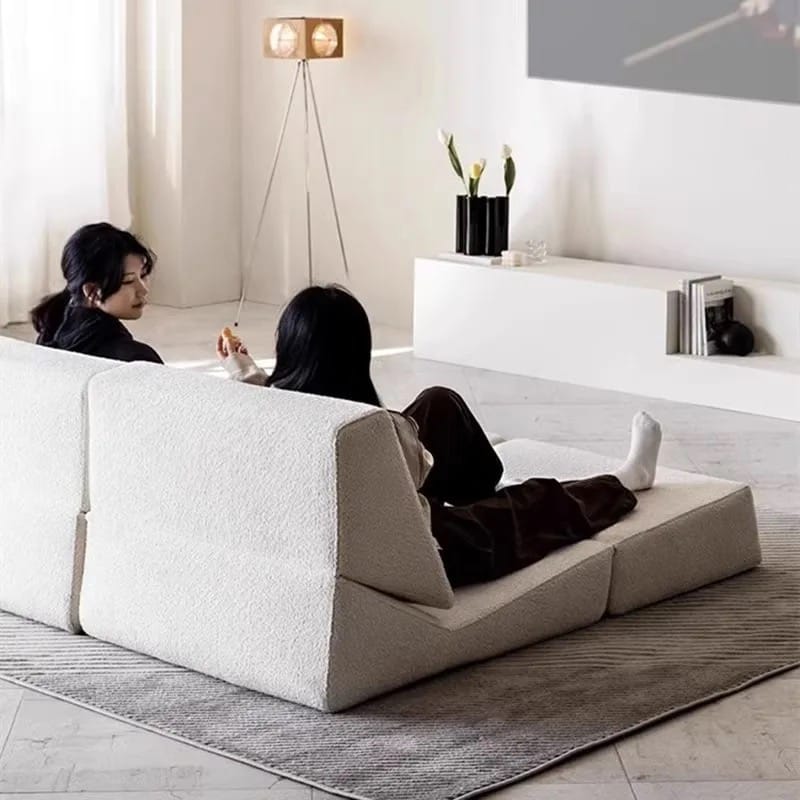 Woman are Chilling in a 3 -in- 1 Sofa Bed.