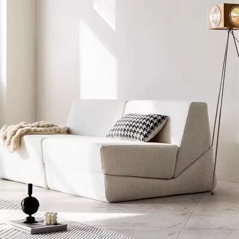 A 3 -in- 1 Sofa Bed is Arranged in the Living Area.