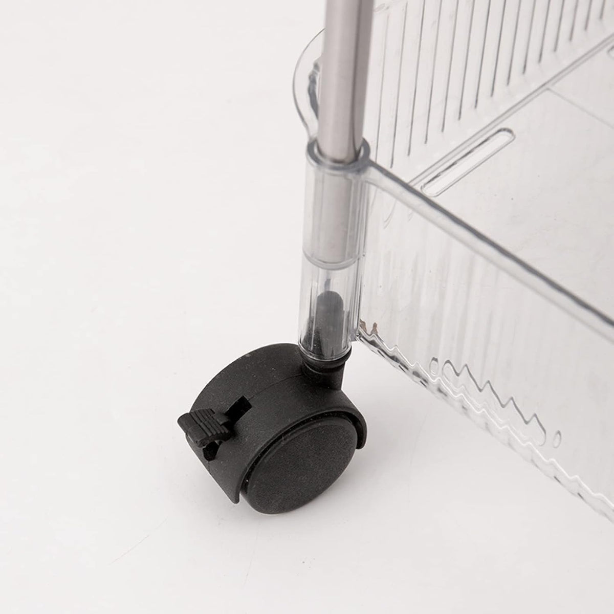 Black wheel of a 4-Tier Rolling Storage Cart.