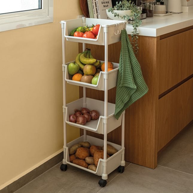 4-Tier Rolling Storage Rack Organizer Organized with Fruits and Veggies near Kitchen cabinet.