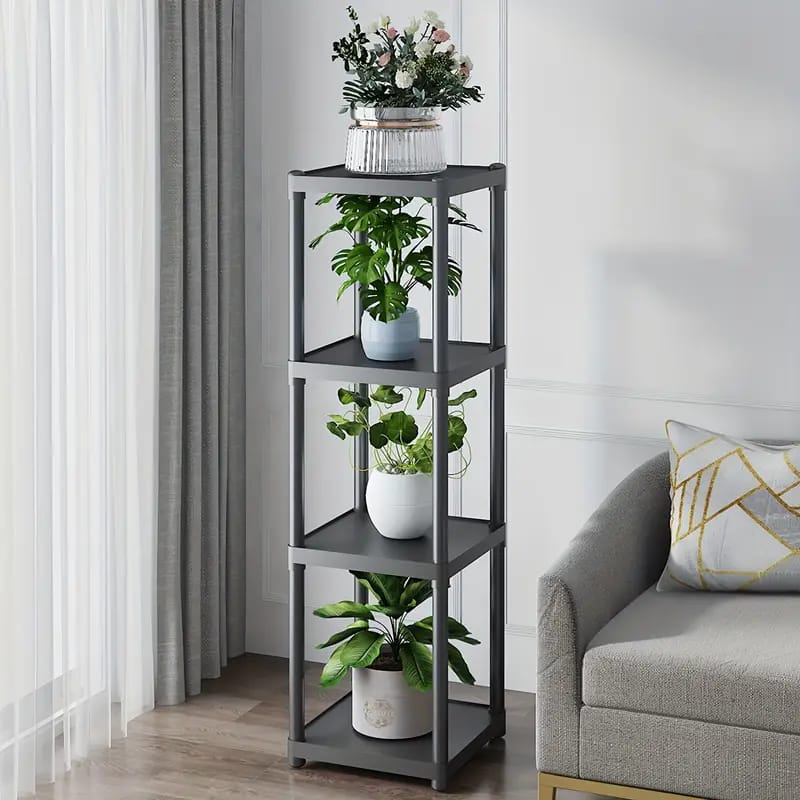 4- Tier Flower Rack Stand With Plants Are Arranged On it.