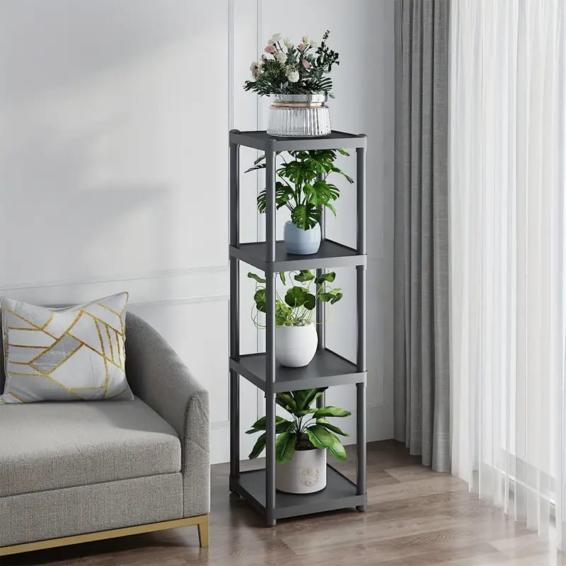 4- Tier Flower Rack Stand With Plants Are Arranged On it.