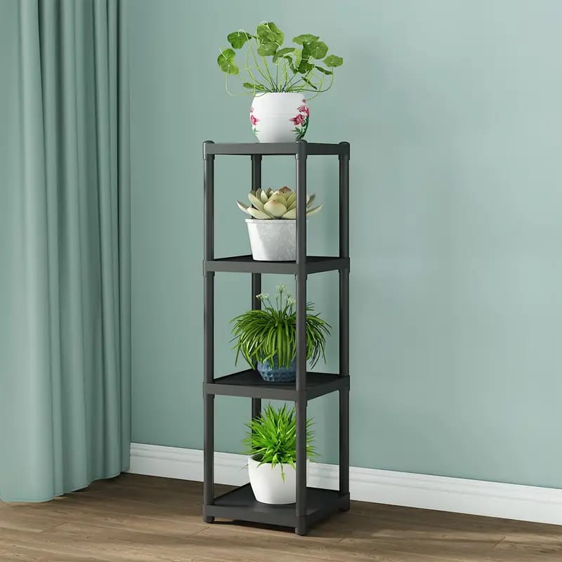 4- Tier Flower Rack Stand With Plants Are Arranged On it.