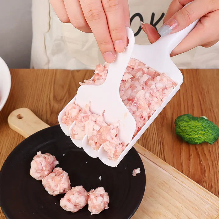 A lady is cooking meatballs with the help of the 4-in-1 Kitchen Meatball Maker Tool