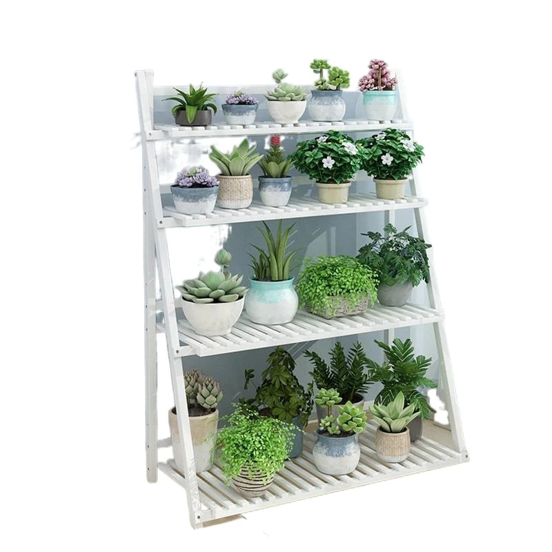 The  white 4-Layer Foldable Indoor Wooden Plant Stand is elegantly arranged with various plants