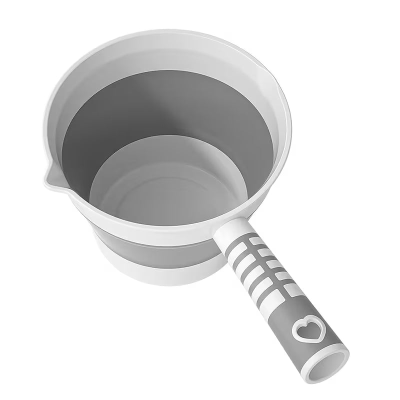 A Ladle from 5-in-1  Baby Foldable Bathtub Set.