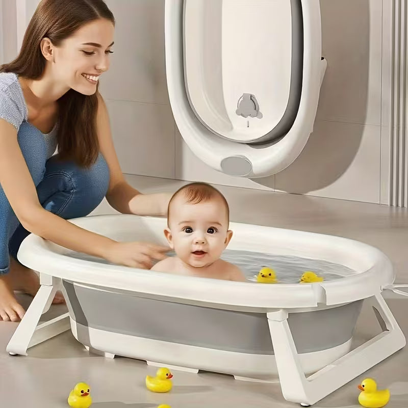 A Baby is Sitting in a 5-in-1  Baby Foldable Bathtub Set While mother is sitting nearby.