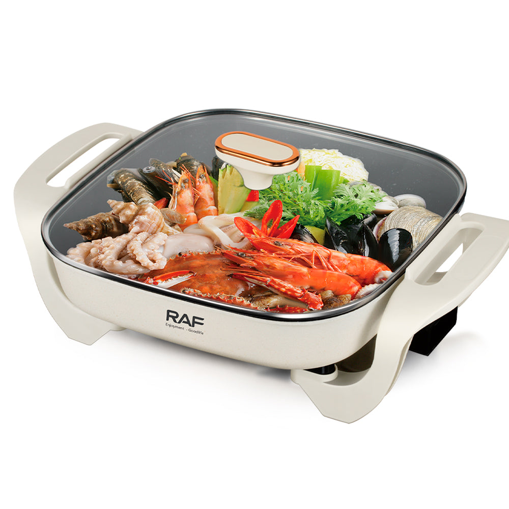 A 5.0L Electric Hot Pot Pan with Food in it.