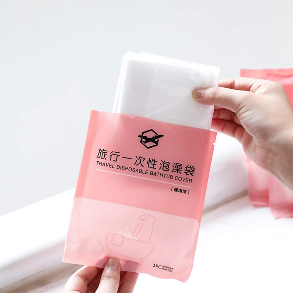 Someone taking the Disposable Bathtub Bag, portable clear disposable bathtub bathing cover film liner