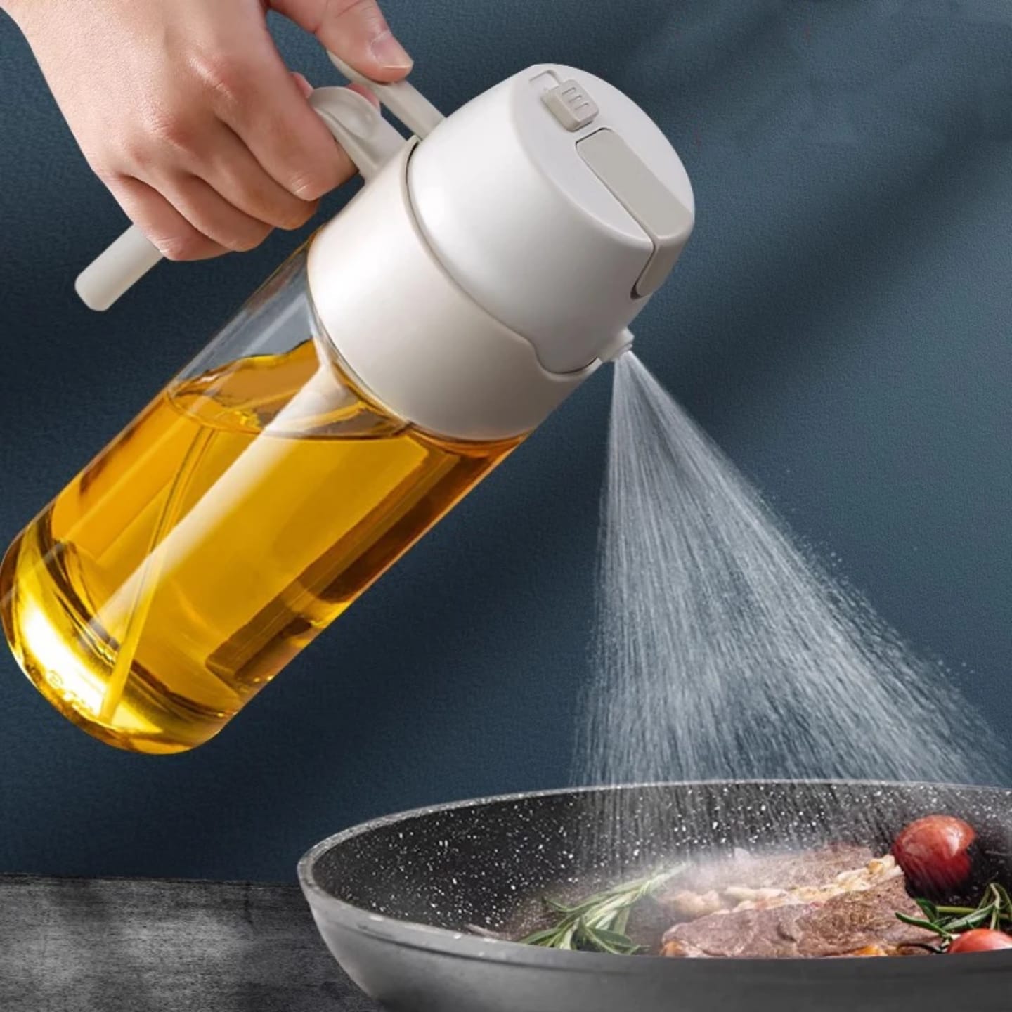 A Person is Spraying oil in to a Dish Using 550ml Oil Dispenser Spray Bottle.