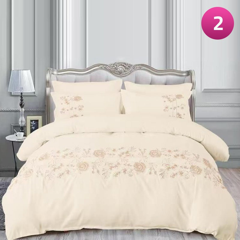 6-piece bedding set with floral comforter, fitted sheet, and pillow covers on a king bed.
