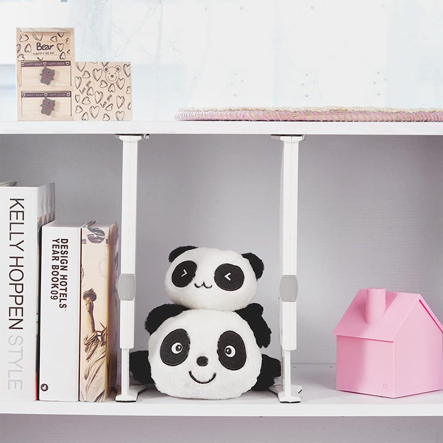 A shelf full of toys and books separated with the help Shelf Partition Divider Organizer