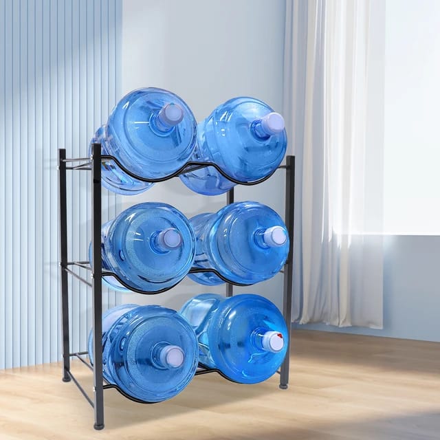 5 Gallon Water Bottle Stand placed in the room with some bottles