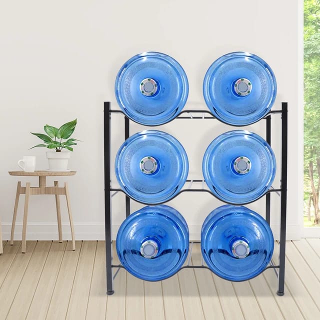 5 Gallon Water Bottle Stand placed in the room with some bottles