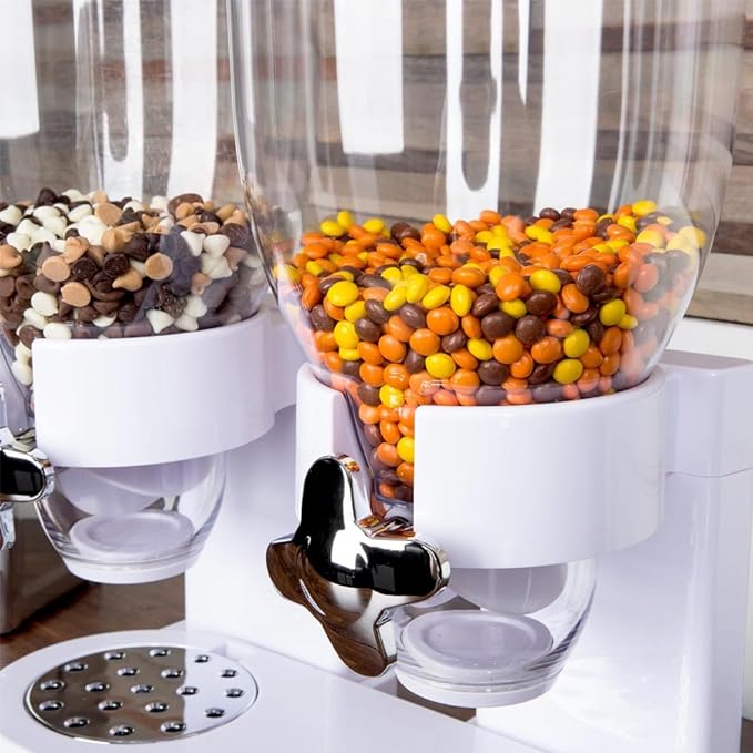 Image exposing the double head of Snack and Cereal Dispenser filled with chocolate chips  