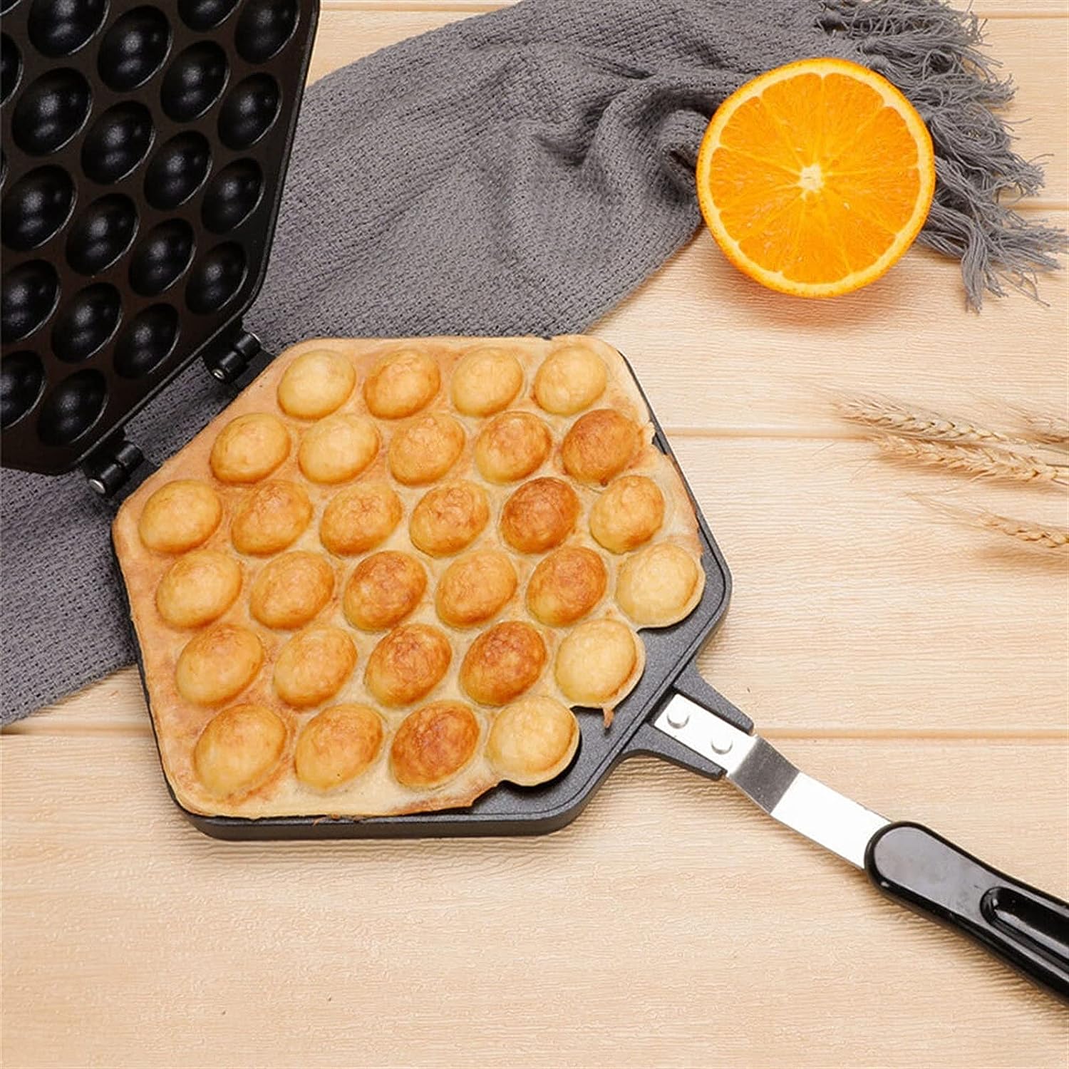 Non-stick Egg Puffs Maker Pan with food on it